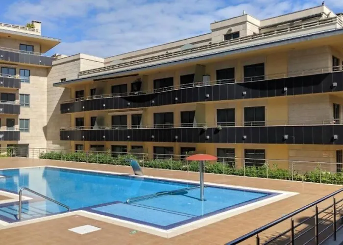 En Urbanizacion Con Piscina En Playa De Silgar Appartement *